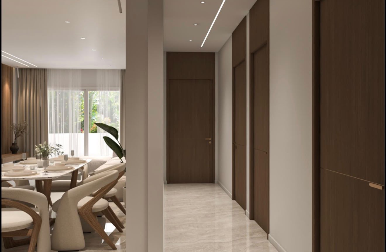 Warm walnut hallway leading to a dining space